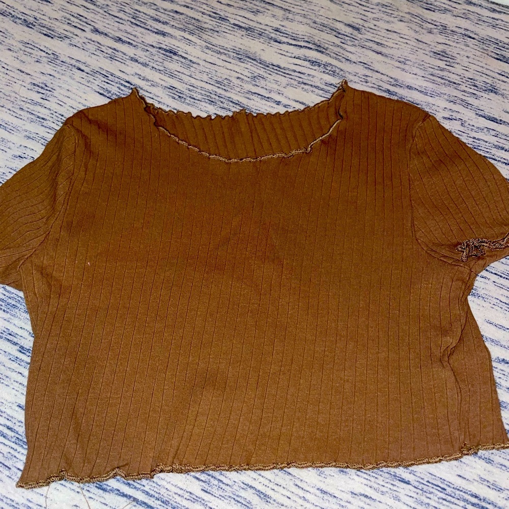 A cropped brown shirt! Great outfit for summer